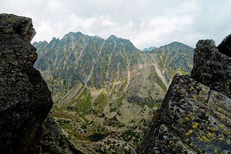 Mountain lake over the waterfall Skok, Slovakiaの写真素材