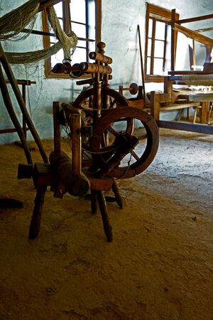 Spinning wheel on hempの写真素材