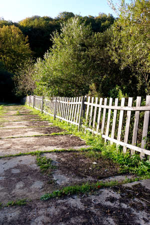 Concrete panels with wooden fenceの写真素材