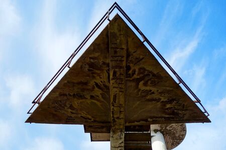 Old abandoned lookout tower on the lake beachの写真素材