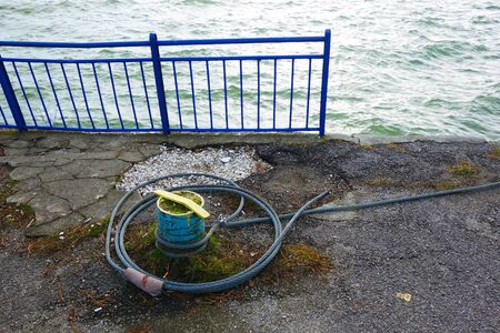 Dockyard off season with steel rope on pier