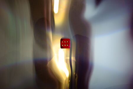 Game cube on mirrored plastic foil