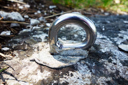 Climbing anchor on a travertine rockの写真素材