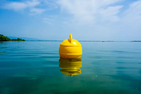 A floating ship buoy near the port, serves as a floating anchor for shipsの写真素材