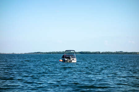 Motor boat moored on the lake in a recreation centerの写真素材