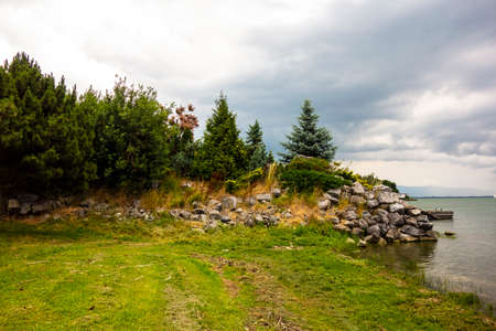 View of the lake with a rocky wall resembling a rock garden