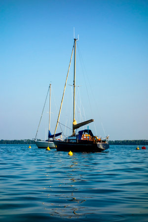 Sailboat moored in the harbor for boats, yachts and sailboats in a recreational destination