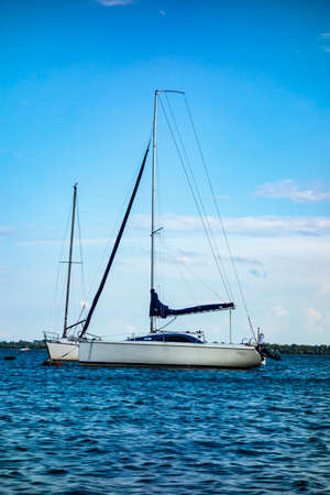 Sailboat moored in the harbor for boats, yachts and sailboats in a recreational destination