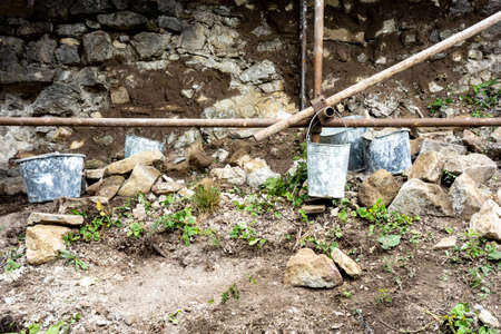 Buckets on the reconstruction site of the castleの写真素材