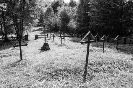 War cemetery after the First World War in the forest near the village of ZbojnÃ© Slovakia, mostly Austro-Hungarian and German soldiers and several Russian soldiers are buried hereの写真素材