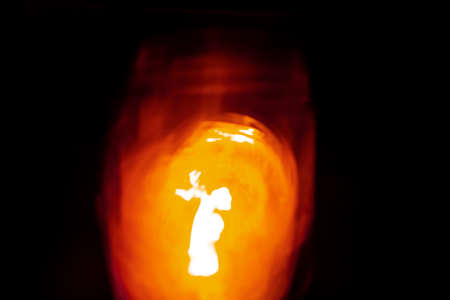 An abstract light photographic formation created by photographing a burning candleの写真素材