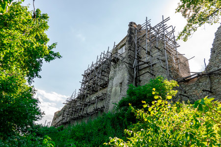 The ruins of Vinne Castle and its surroundings in the Zemplin region of Slovakia during reconstructionのeditorial素材