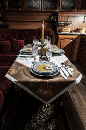 Prepared dining table before Christmas eveningの写真素材