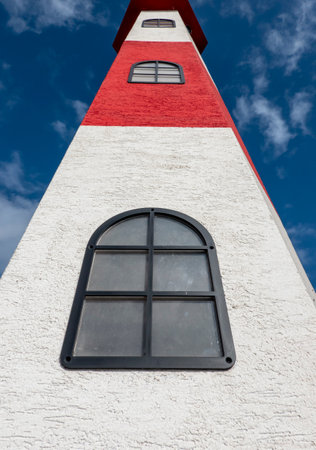 Lighthouse on the shores of the lake harborの写真素材