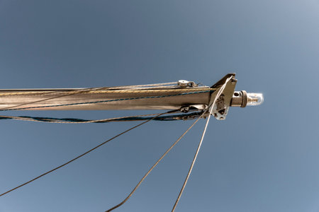 A signaling device on top of a sailing ship's mast