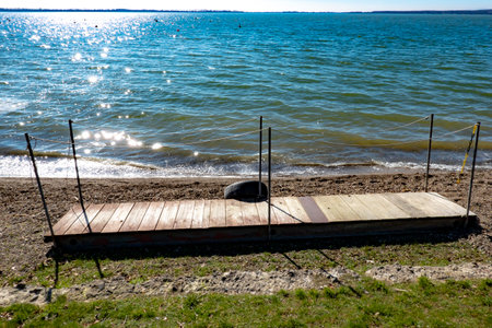 Floating pier on the shoreの写真素材