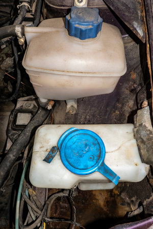 Plastic containers for car engine coolant and washer fluidの写真素材