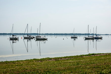 Sailboat moored in the harbor for boats, yachts and sailboats in a recreational destinationの写真素材