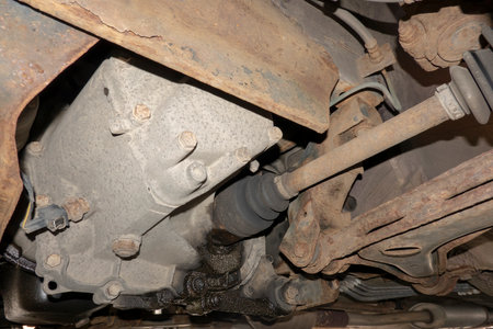 A view of the chassis of an old corroded twenty year old carの写真素材