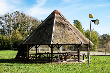 Wooden gazebo in the fall