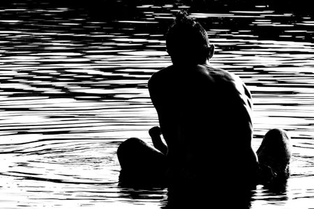 Father with son in lakeの写真素材