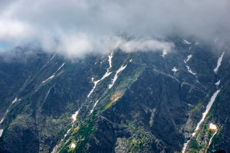 A beautiful view of the surroundings of the High Tatras from the Lomnicke saddle, Slovakiaの写真素材