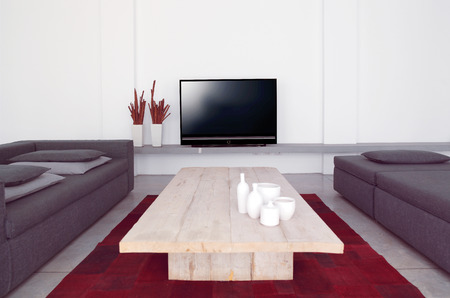 Modern living room with sofa and televisionの写真素材