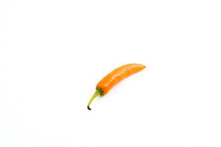 Yellow chili pepper isolated on a white background