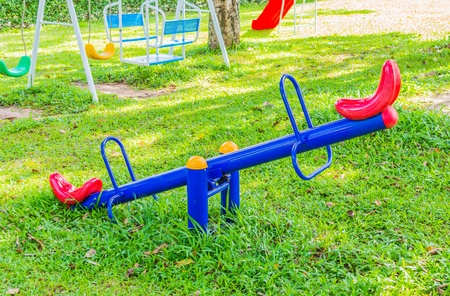 A colorful playground in a park.