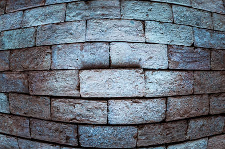 Grunge background of brick wall texture.Fisheye lens viewの写真素材