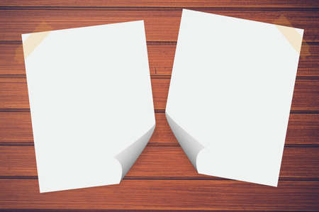 Blank paper on the wood backgroundの写真素材