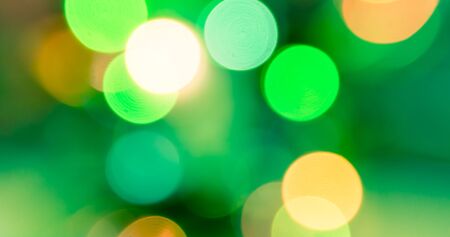 Abstract circular green bokeh abstract light backgroundの写真素材
