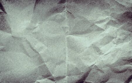 Crumpled paper background vignette space for text or image.Old paper textureの写真素材
