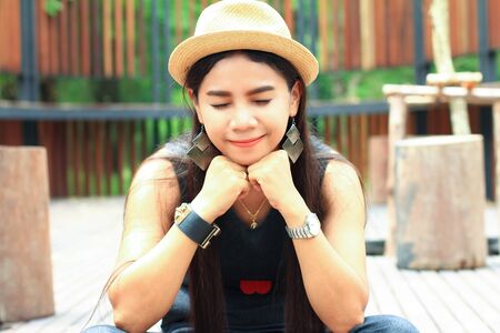 portrait of a beautiful young woman thinkingの写真素材