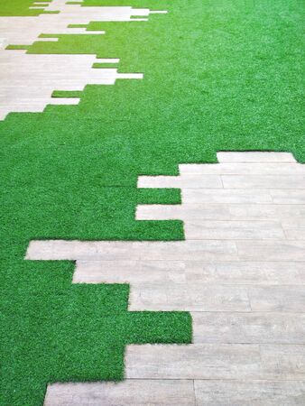 garden decoration with flooring artificial grass, backyard with decorative modern building,space for activity area の写真素材