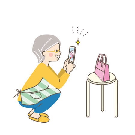 Senior women shooting products for sale on flea market apps on their smartphonesのイラスト素材