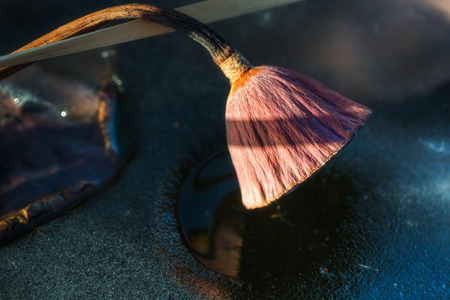 Dry lotus flower in the ice of a frozen lakeの写真素材