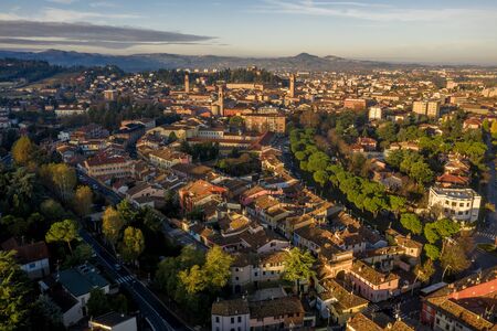 Morning aerial panorama of Cesena in Emilia Romagna Italy near Forli and Rimini, with medieval Malatestiana castle, Piazza del Popolo and Roman Catholic churches and cathedralの写真素材