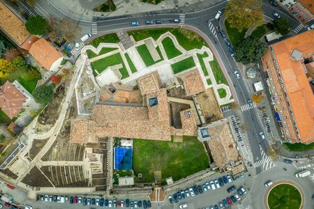 Aerial panorama view of the Adriatic beach town Rimini in the winter with the ancient Tiberius bridge, Sismondo Malatesta castle and Gothic  city hallの写真素材