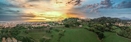 Picturesque aerial sunset panorama of Bergamo historic upper town (citta alta) in Lombardy Italy