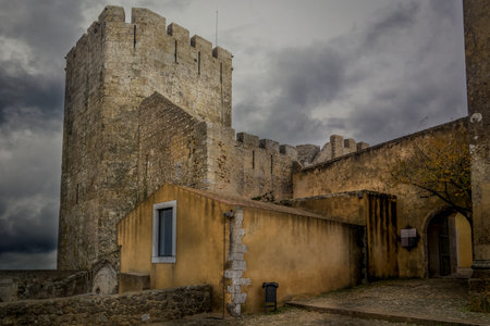 Aerial panorama view of Palmela castle pousada with stunning blue sky and old wind mills near Setubal Portugalのeditorial素材