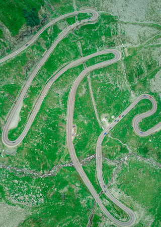 Curving road near Lake Balea on the Transfagaras pass in the Carpathian mountains Romaniaの写真素材