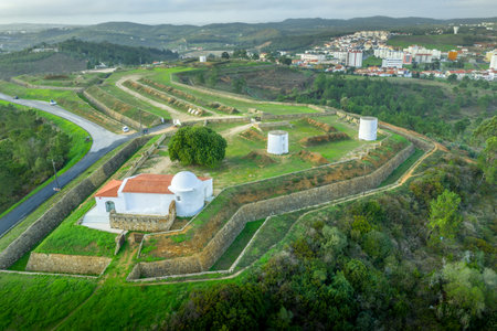 Aerial view of Fort St. Vincent in Torres Vedras, nineteenth century military fortification composed of masonry and earthwork with detached bastions for cannons, ditch , counterscarp on a hillのeditorial素材
