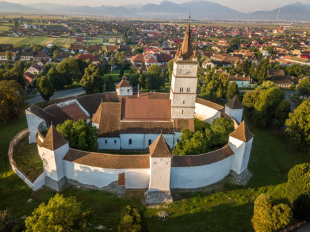 Aerial view of Harman Szaszhermany fortified Saxon medieval church in Transylvania Romaniaの写真素材
