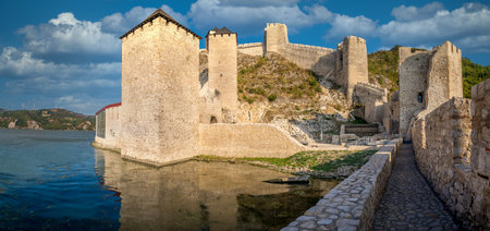 Summer afternoon view of restored medieval Golubac fortress, trdava Golubac  on the bank of the Danube in Serbia for Yugoslavia across from Romania major tourist destinationのeditorial素材