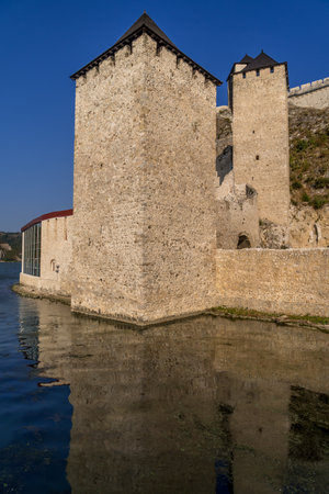 Summer afternoon view of restored medieval Golubac fortress, trdava Golubac  on the bank of the Danube in Serbia for Yugoslavia across from Romania major tourist destinationのeditorial素材