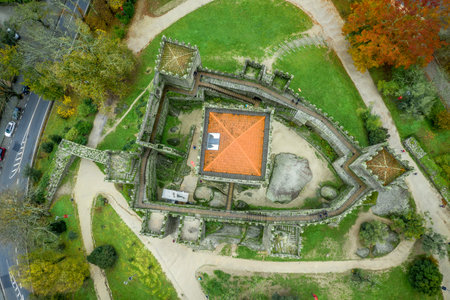 Aerial view of well-preserved medieval buildings hilltop, 10th-century GuimarÃ£es Castle with its sweeping city views. Restored Dukes of BraganÃ§a Palace, Romanesque SÃ£o Miguel do Castelo Churchのeditorial素材