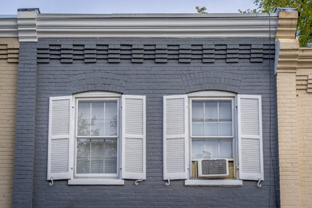 Georgian colonial style luxury house with white windows and gray brick facade in Georgetown Washington DC USAの写真素材