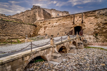 Lleida Lerida entrance to the fortification on the Castell de la Suda,  La Seu Vella  ancient royal castle with Arab origins modified in the 18th century for modern warfareの写真素材