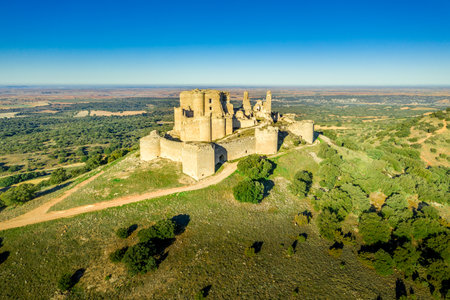Aerial view of medieval castle ruin Pueble de Almenara in Cuenca Spain with concentric walls, semicircular towers and angle bastionsの写真素材